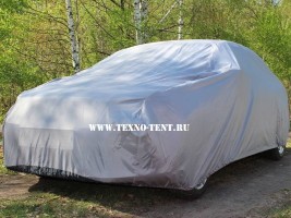 Стандартный тент на автомобиль Volkswagen Polo Sedan, светло-серого цвета из ткани Оксфорд 210den для защиты автомобиля от солнца и грязи на улице.