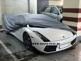 Стандартный тент чехол для Lamborghini Gallardo. Используется для защиты автомобиля автомобиля в паркинге и на улице. Тент светло-серого цвета, ткань Оксфорд 210den.